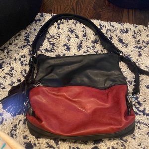 This is a espe vegan bag. It is red and black